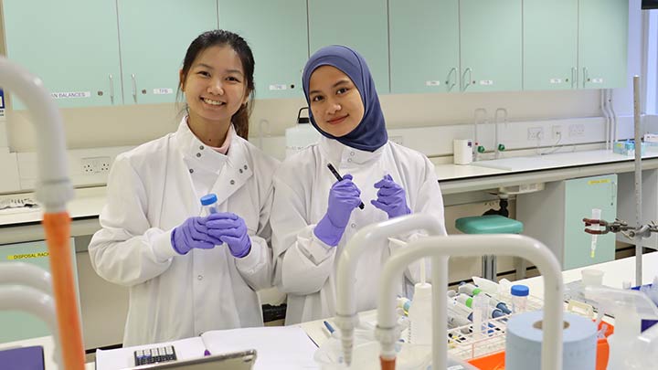 Two students in a lab