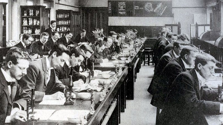 Students working in pathology lab, 1900.