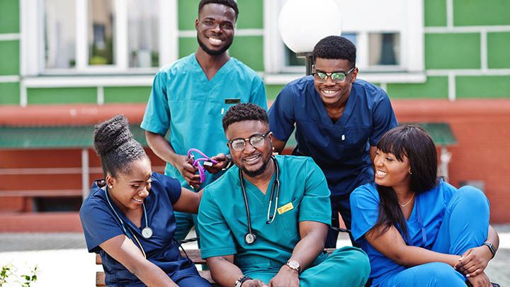 Medical students outside a clinic.
