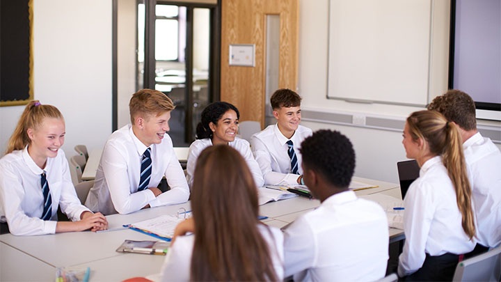 A group of secondary school pupils working on a project together.