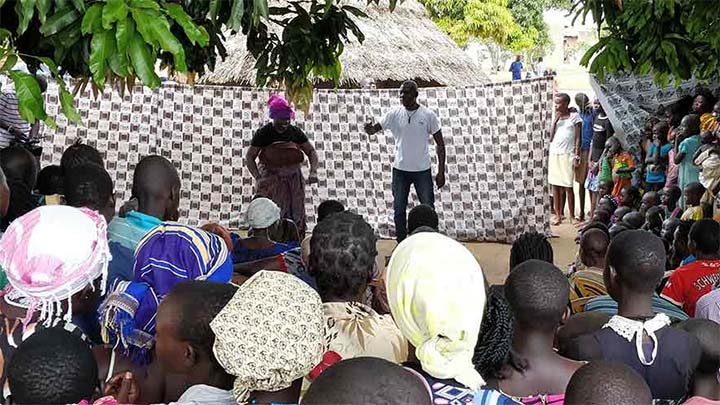 A photo of a street performance in Uganda.