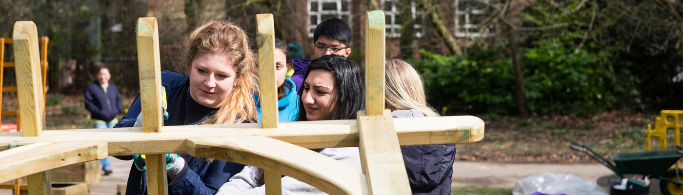 Students looking at a bone