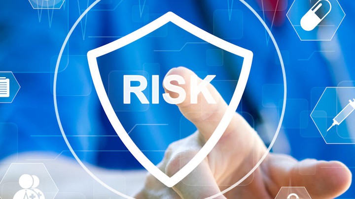 A graphic of a shield with the word 'risk' in the middle.