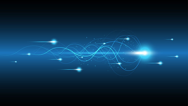 Abstract blue image showing light crossing over to one side, forming a pathway.