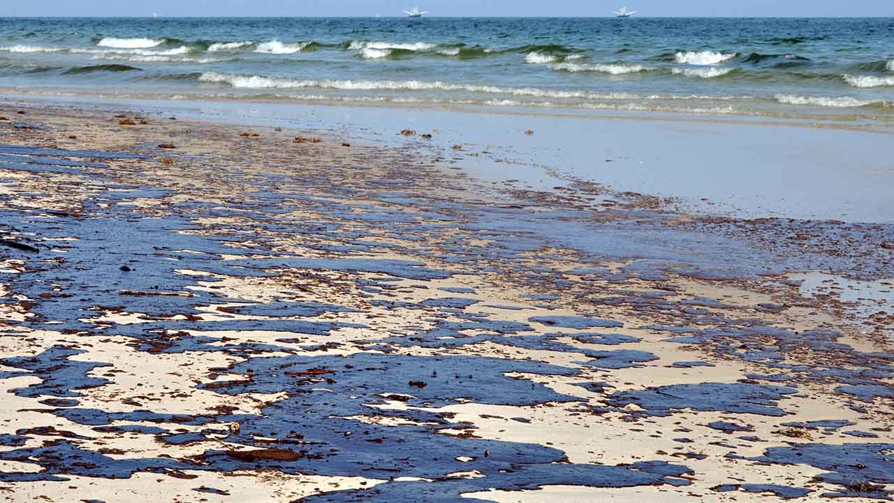 Gulf oil spill is shown on a beach on June 12, 2010 in Gulf Shores, Alabama.