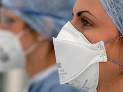 Image: Pharmacists wearing masks