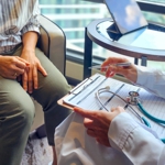 A patient and doctor in a medical consultation.