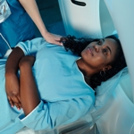 A patient entering an MRI scanner.