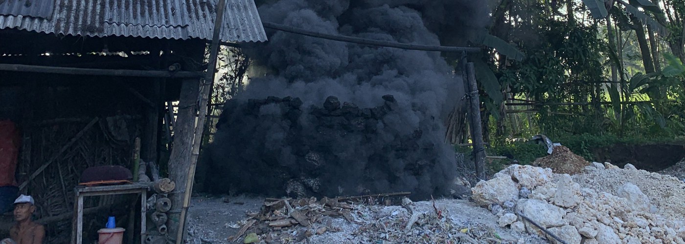 Plastics being burned in a village in Indonesia.