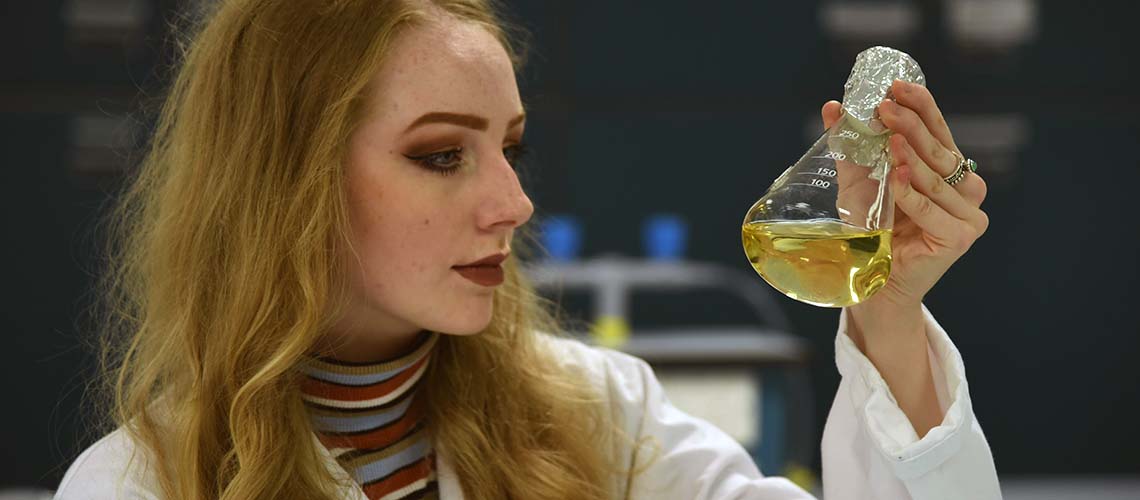 Woman with hayfever sneezing