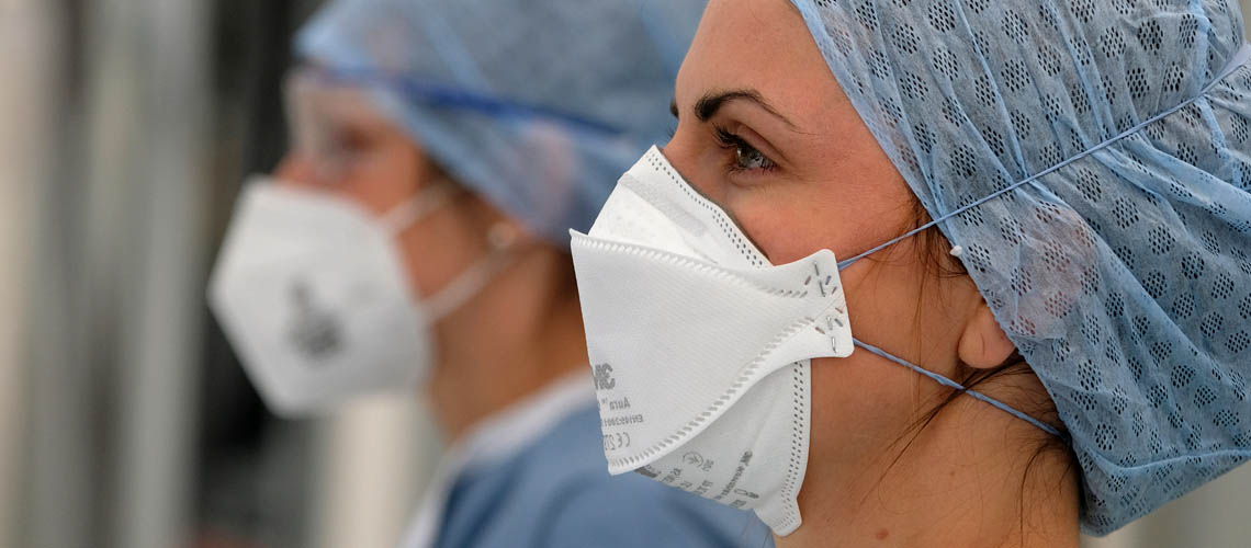 Medical staff wearing PPE masks