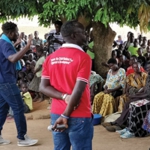 An outdoor gathering in Uganda.