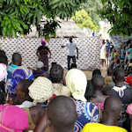 A photo of a street performance in Uganda.