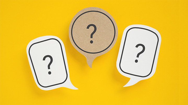 Three speech bubbles containing a question mark.