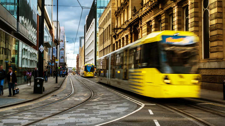 A tram travelling through Manchester City Centre.