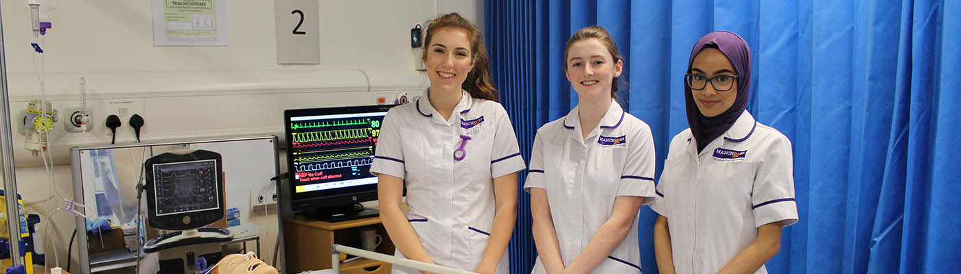 Three of our student midwives in the clinical skills suite.