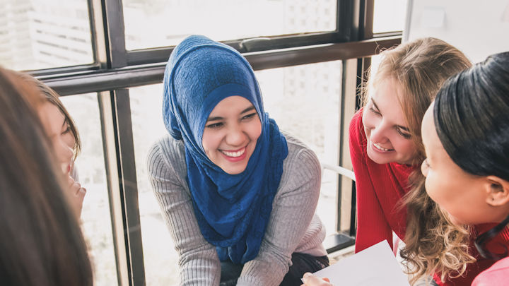 A group of students talking.