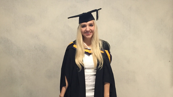 Lauren in her graduation robes.