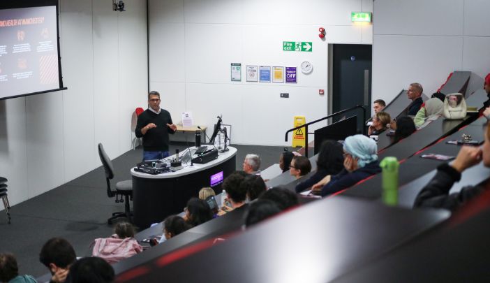 A presentation is delivered in a lecture theatre