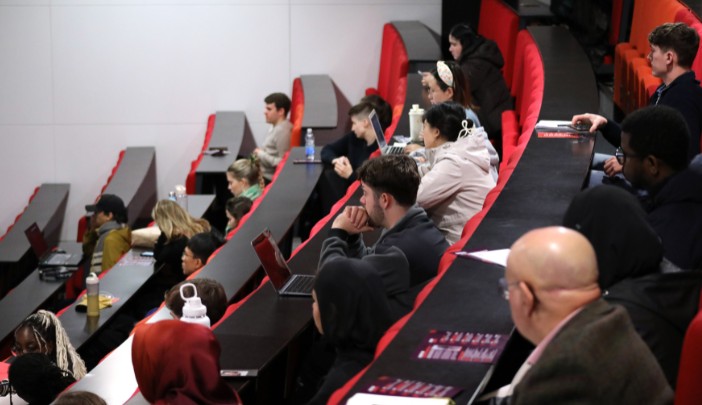 Open Day attendees sat in a lecture theatre welcome talk