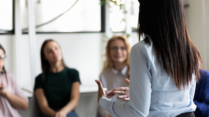 A speaker giving a seminar.