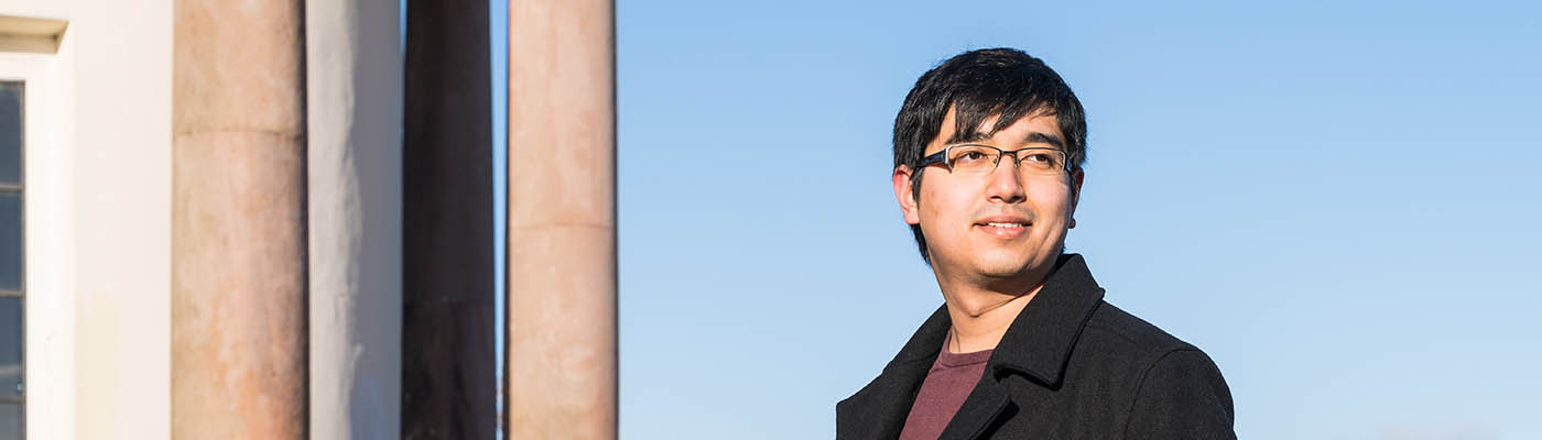 Student with sky backdrop